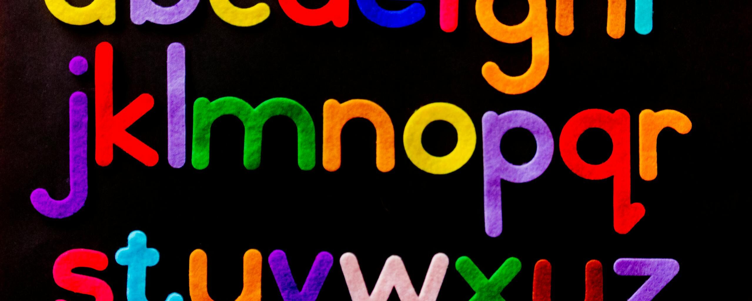 Alphabet Letter Text on Black Background
